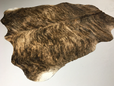 brown cowhide rug
