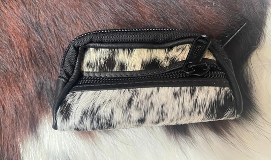 A cowhide mini purse