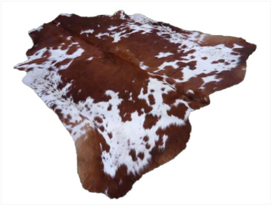 White and Brown Cowhide Rug.