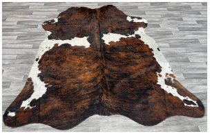 a dark brown rug with a white texture