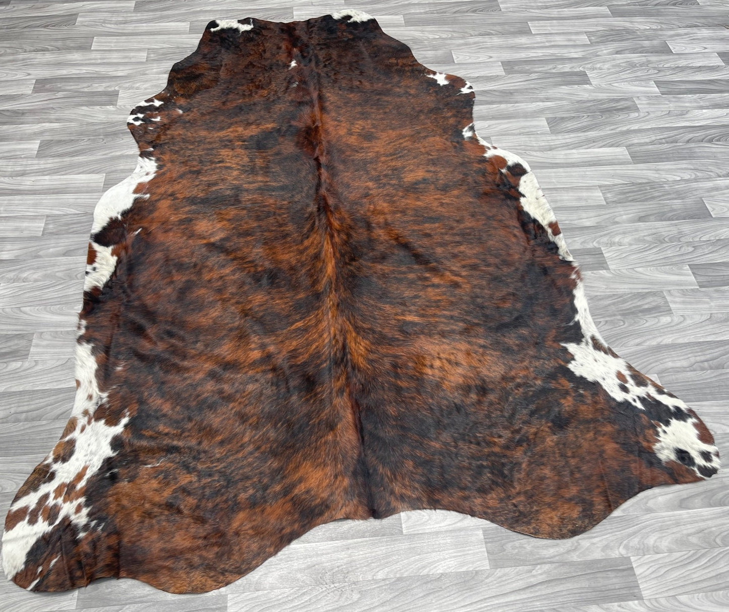 Cowhide Rug v 196 red brindle