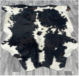A Black and White Cowhide Rug