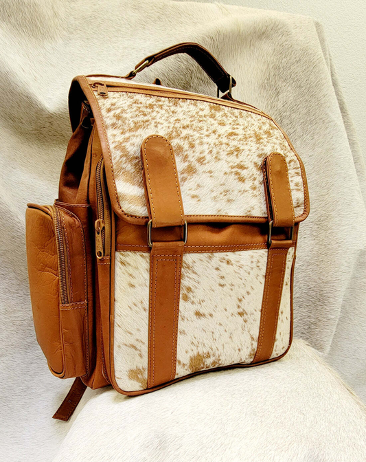 a gorgeous cowhide bag perfect for travels with stunning colors and patterns