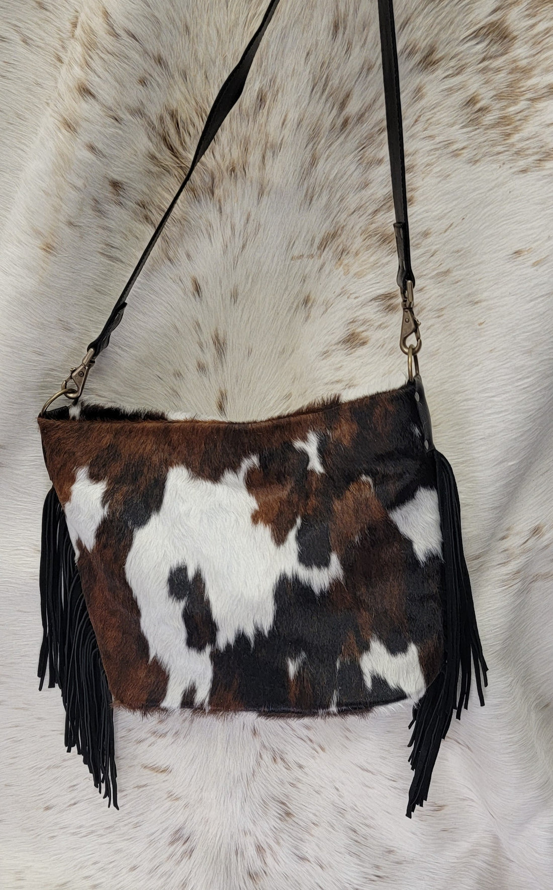 cowhide fringe purse