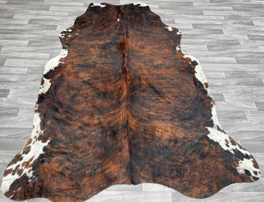 Cowhide Rug v 196 red brindle