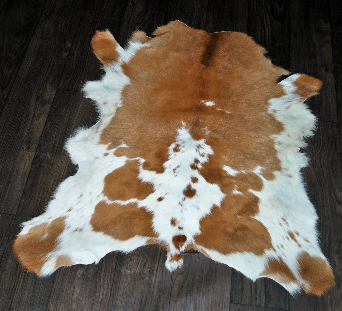 red and white cowhide rug
